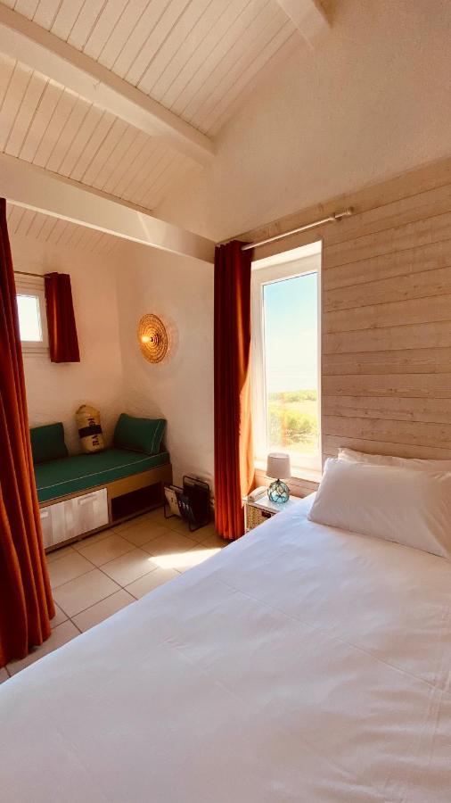 Hotel Ile De Lumiere ลาโกตินิแยร์ ภายนอก รูปภาพ