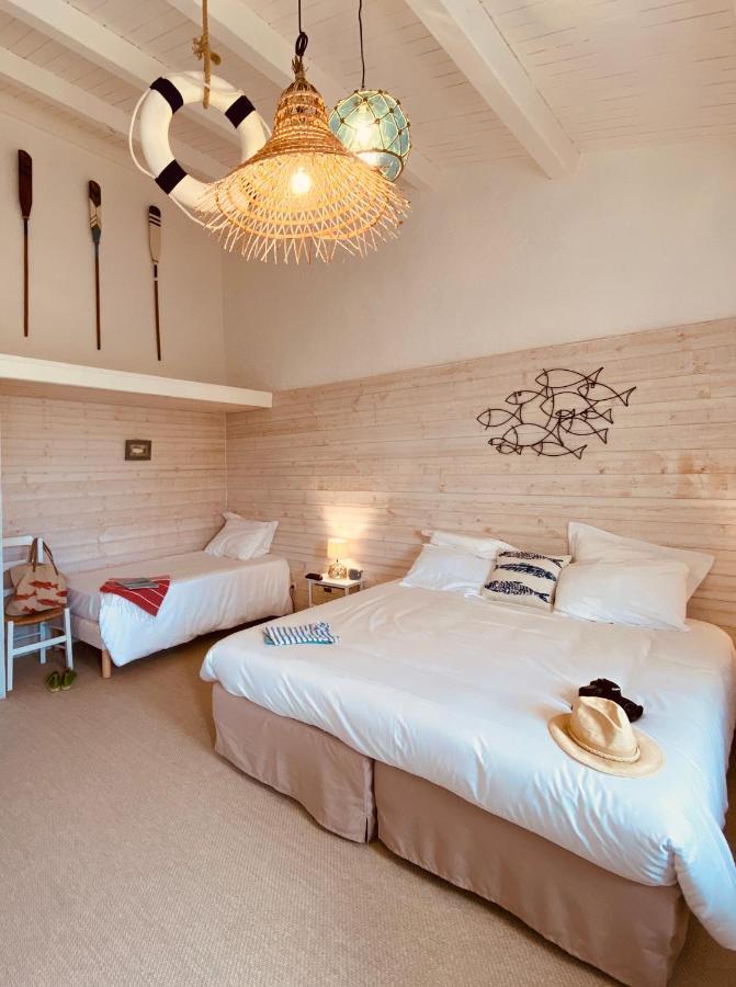 Hotel Ile De Lumiere ลาโกตินิแยร์ ภายนอก รูปภาพ