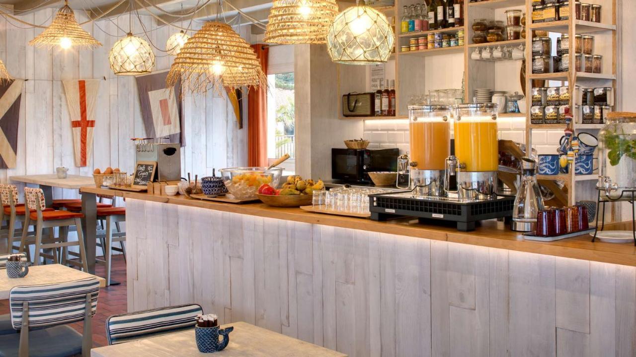 Hotel Ile De Lumiere ลาโกตินิแยร์ ภายนอก รูปภาพ