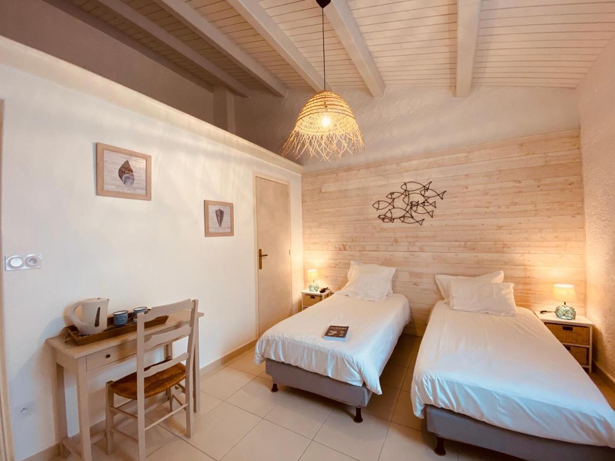 Hotel Ile De Lumiere ลาโกตินิแยร์ ภายนอก รูปภาพ