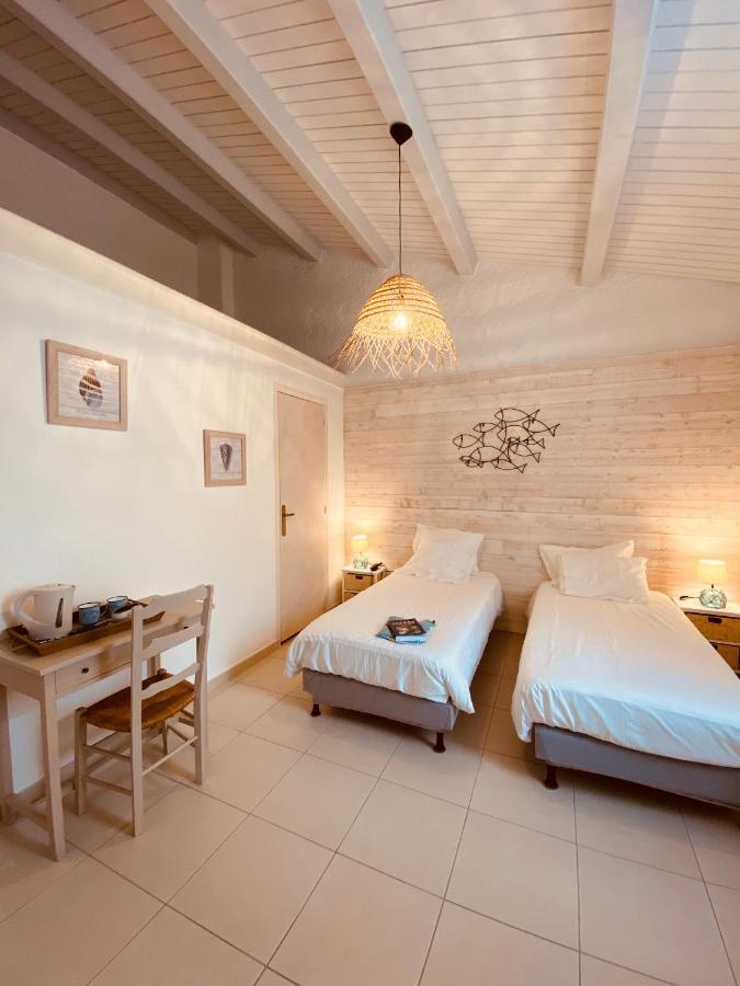 Hotel Ile De Lumiere ลาโกตินิแยร์ ภายนอก รูปภาพ